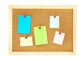 Pin a color note paper on cork pin board , isolated on white Royalty Free Stock Photo