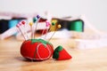 Pin Cushion on table Royalty Free Stock Photo