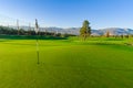 Pin flag pole in hole on golf course Royalty Free Stock Photo