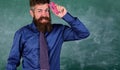 Pin it on mind. Teacher bearded man with pink stapler chalkboard background. Teaching memorization techniques. Hipster