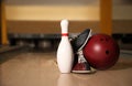 Pin, shoes and ball on alley in bowling. Space for text Royalty Free Stock Photo