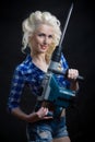 Pin-up blonde with industrial hammer.