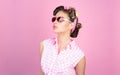 Pin up girl. beauty salon and hairdresser. vintage housewife woman make hairstyle. happy girl in summer glasses. retro