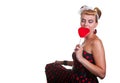 Pin-up Girl with heart shaped candy Royalty Free Stock Photo
