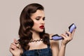 Pin-up girl holding retro-style telephone receiver Royalty Free Stock Photo