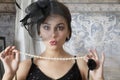 Pin up girl with pearl necklace Royalty Free Stock Photo