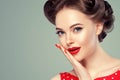 Pin up girl vintage. Beautiful woman pinup style portrait in retro dress and makeup, manicure nails hands, red lipstick and polka Royalty Free Stock Photo