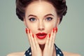 Pin up girl vintage. Wow expressions emotion! Beautiful woman pinup style portrait in retro dress and makeup, manicure nails hands Royalty Free Stock Photo