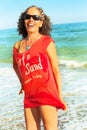 Pin-up mature woman Beach sea Red t-shirt Royalty Free Stock Photo