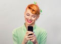 Pin up style girl texting Royalty Free Stock Photo