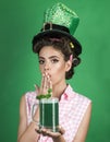 Pin up woman with trendy makeup. pinup girl with fashion hair. retro woman drink summer cocktail. St. Patricks Day Royalty Free Stock Photo