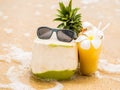 Pina Colada cocktail with fruits on the beach while on vacation Royalty Free Stock Photo