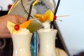 Pina Colada, exotic Cocktail ready to serve and is poured into a glass