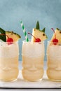 Pina colada in a tiki glass, tropical tiki cocktail with coconut and pineapple Royalty Free Stock Photo