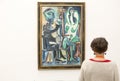Aritst and model Picasso painting in Pinakothek der Moderne in Munich