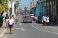 People move by the street in downtown in Pinar del Rio, Cuba.