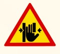 Pinch point hazard, caution sign. Keep hands clear