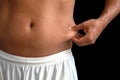 Pinching body fat Royalty Free Stock Photo