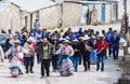 PINCHOLLO, COLCA VALLEY, PERU - JANUARY 20, 2018: Group of peruvian people parade through the village of Pinchollo, Colca Valley,