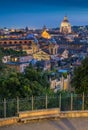 Panorama at sunset from the Pincio Terrace in Rome, Italy.