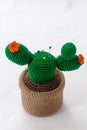 pincushion in the shape of a cactus in a pot. Royalty Free Stock Photo