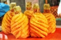 Pine apple craved into textures on the streets for sale