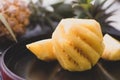 Pine apple pulear on black place and wood background