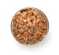 Pine bark mulch chips in glass bowl Royalty Free Stock Photo