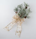 Pine Bough Decoration with Sparkly Gold Bow Royalty Free Stock Photo