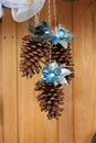 Pinecone Christmas Decoration with Silver and Blue Leaves Royalty Free Stock Photo