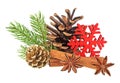 Pine cone, fir tree branch, cinnamon sticks and anise stars on white background. Christmas decorations Royalty Free Stock Photo