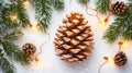 Pine Cones and String Lights on Snow-Covered Pine Branches Royalty Free Stock Photo