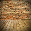 Pine floor and brick wall Royalty Free Stock Photo