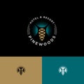 Pine Forest logo. Hotel and resort. Pine cone and needles in a circle with letters.