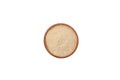 Pine Kernel Flour in wooden bowl on white background, top view. Design element. Real pine kernel nuts, dried powder