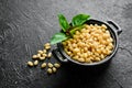 Pine nuts in a black stone bowl. Royalty Free Stock Photo