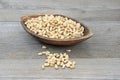 Pine nuts in a small wooden bowl Royalty Free Stock Photo