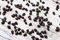 Pine nuts on a white wooden background, close-up