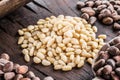 Pine nuts on the wooden table. Organic food. Top view Royalty Free Stock Photo