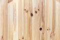 Pine planed board with a beautiful texture and knots. Pine wood background Royalty Free Stock Photo