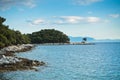 Pine tree on a rock over crystal clear turquoise water, Cape Amarandos at Skopelos island Royalty Free Stock Photo