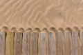 Pine wood deck weathered in beach sand texture Royalty Free Stock Photo