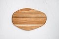 Pine wooden cutting board, on white stone table background, top view flat lay , with copy space for text or your product Royalty Free Stock Photo