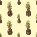 Pineapple ananas with colorful leaves on yellow background. Seamless watercolor pattern Royalty Free Stock Photo