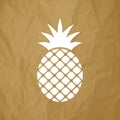 Pineapple Ananas icon white on a crumpled paper brown background.