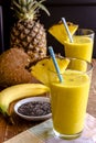 Pineapple, Banana, Coconut, Turmeric and Chia Seed Smoothies Royalty Free Stock Photo