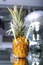 Pineapple cocktail on glass table