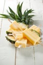 Pineapple coconut popsicles in a cluster on wooden white background Royalty Free Stock Photo