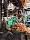 Pineapple and coconut seller in Chandni Chowk, Old Delhi.
