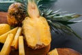 Pineapple on cutting board. Fresh sweet half cut pineapple and whole pineapple fruit. Summer fruit Sliced pineapple Royalty Free Stock Photo